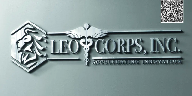 LeoCorps CEO Henry standing in front of company logo